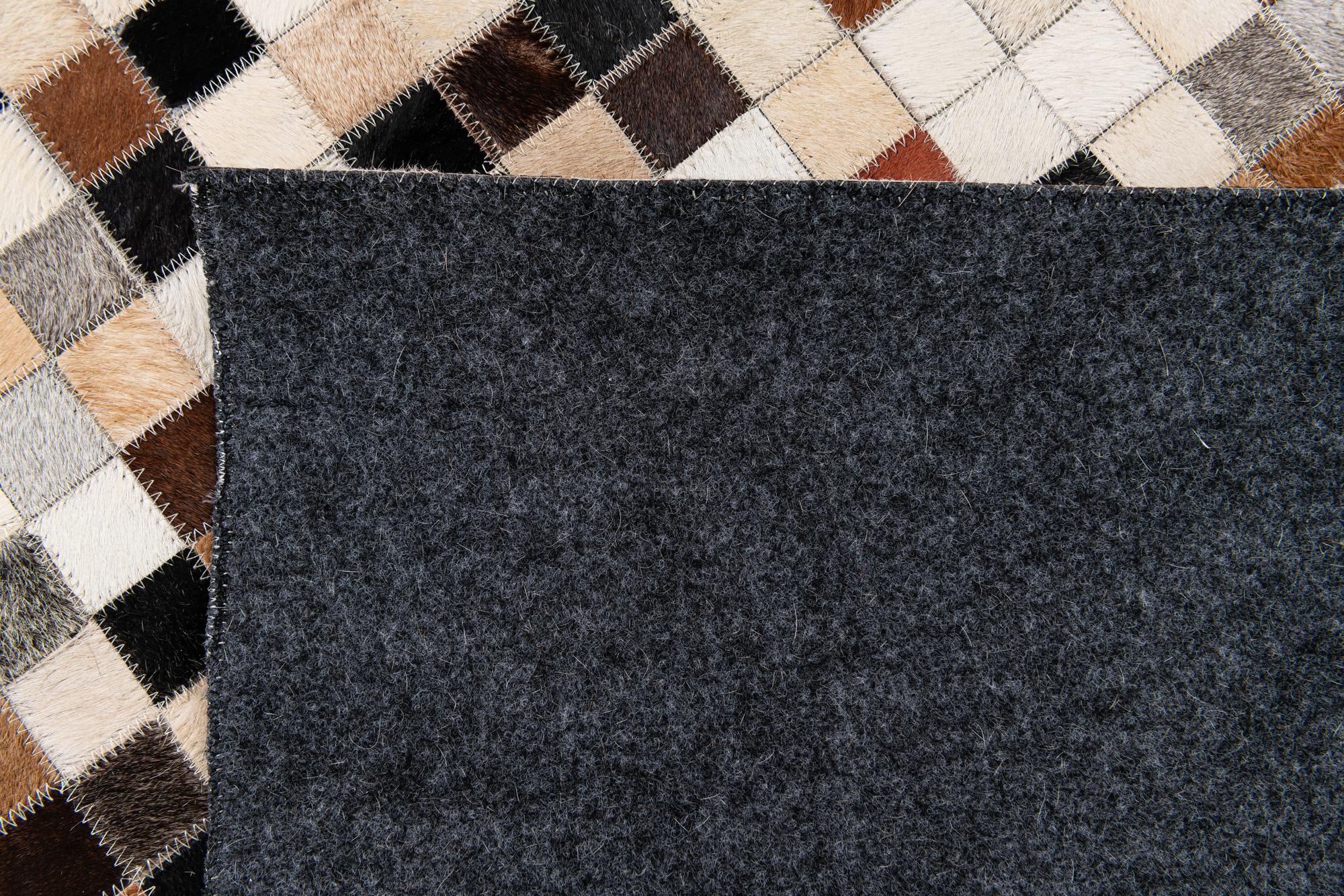 5' 1 x 8' Cowhide Stocks Rug
