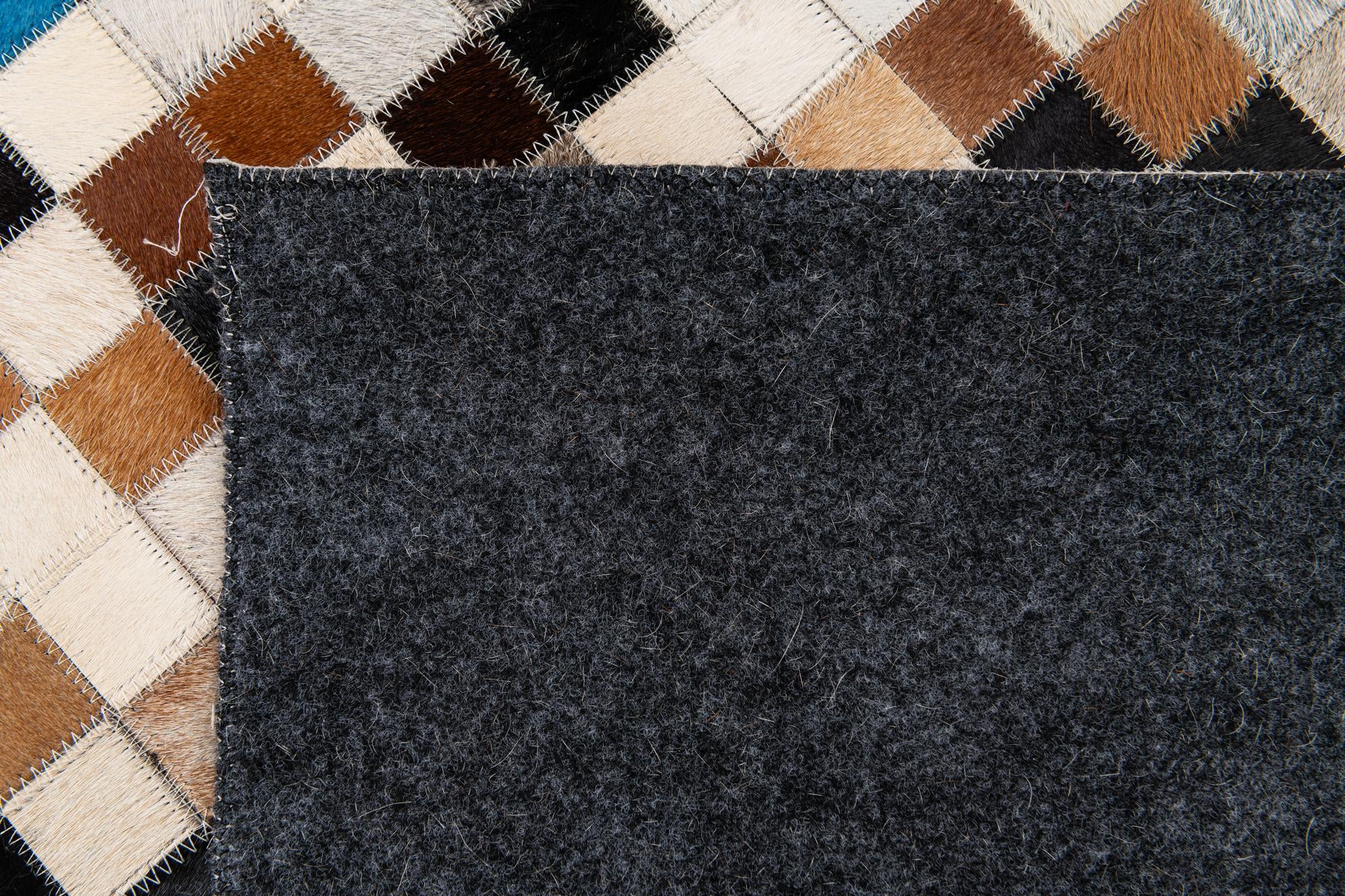 5' 1 x 7' 11 Cowhide Stocks Rug