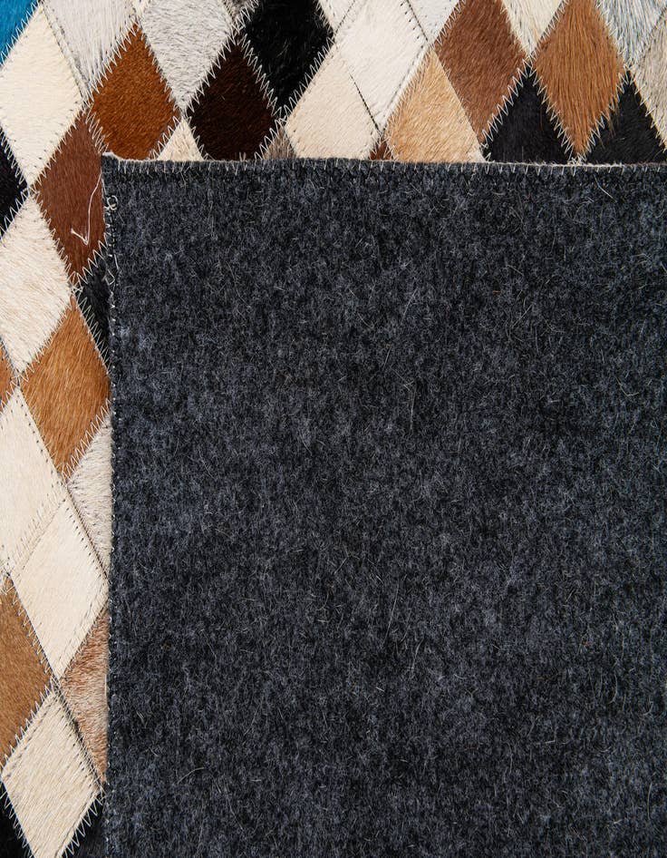 Detail image of 5' 1 x 7' 11 Cowhide Stocks Rug