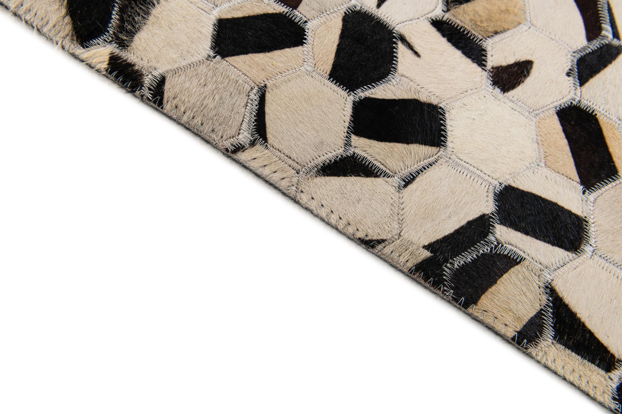5' x 8' Cowhide Stocks Rug