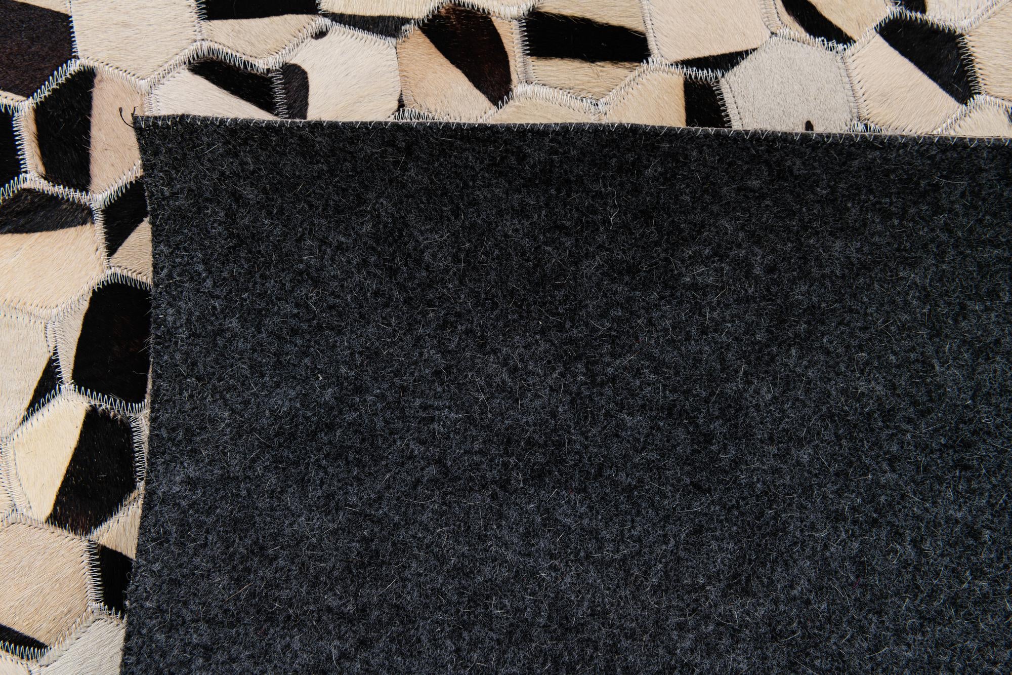 5' x 8' Cowhide Stocks Rug
