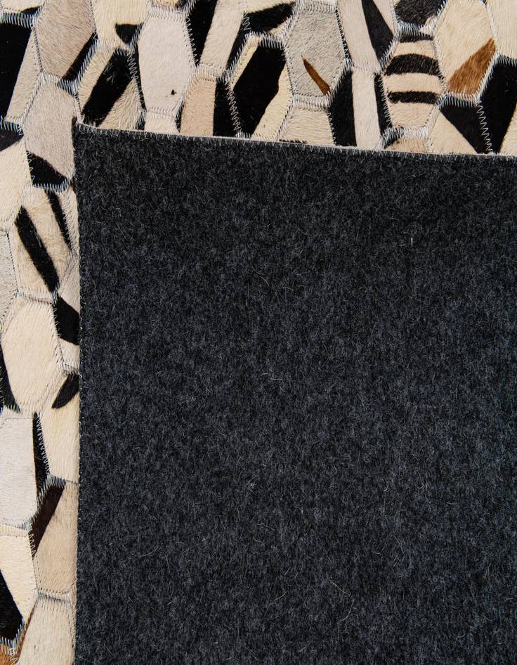 Detail image of 5' 1 x 7' 11 Cowhide Stocks Rug