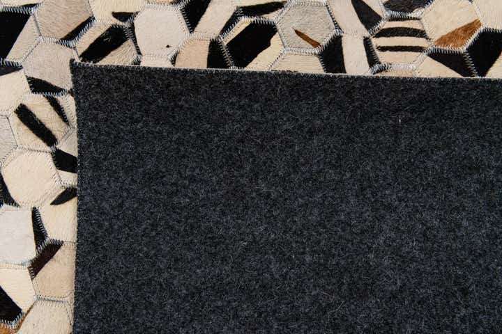 5' 1 x 7' 11 Cowhide Stocks Rug