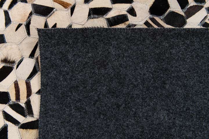 5' x 8' Cowhide Stocks Rug