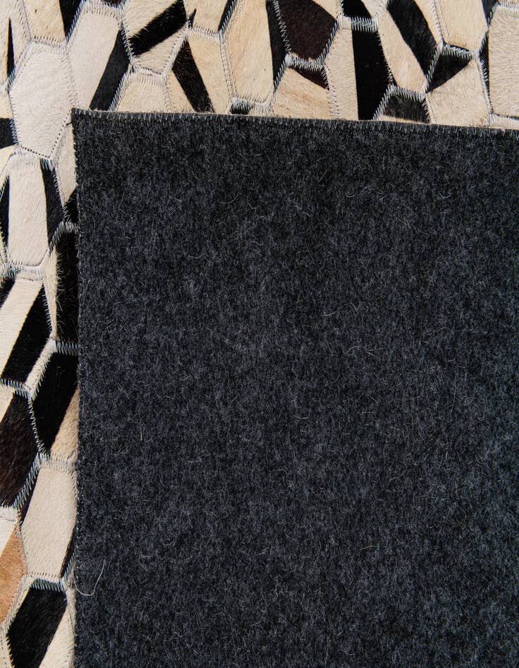 Detail image of 5' 1 x 7' 11 Cowhide Stocks Rug