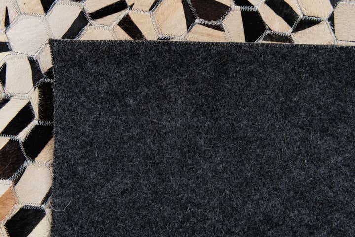 5' 1 x 7' 11 Cowhide Stocks Rug