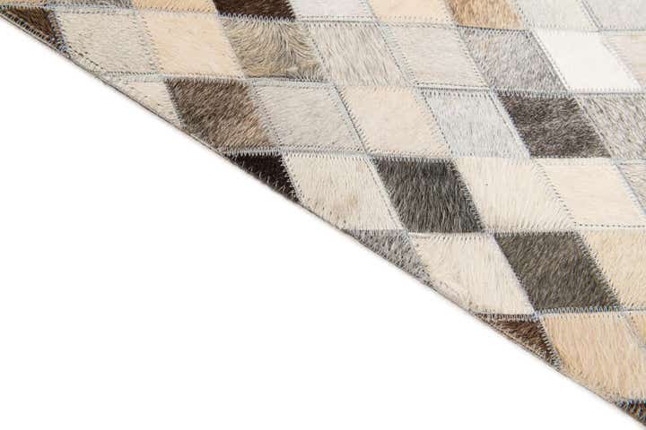 5' 7 x 8' Cowhide Stocks Rug