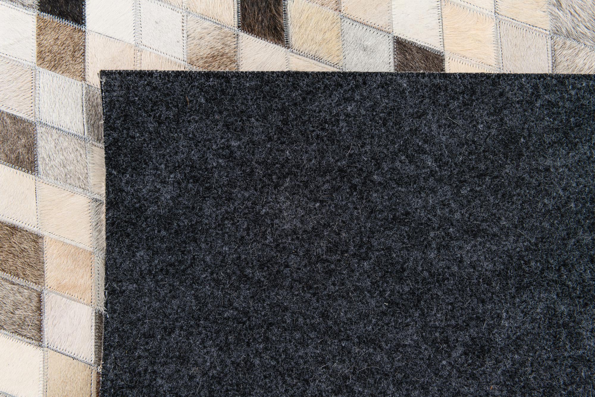 5' 7 x 8' Cowhide Stocks Rug