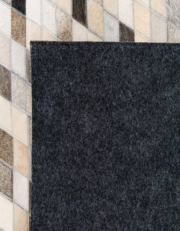 Detail image of 5' 7 x 8' Cowhide Stocks Rug