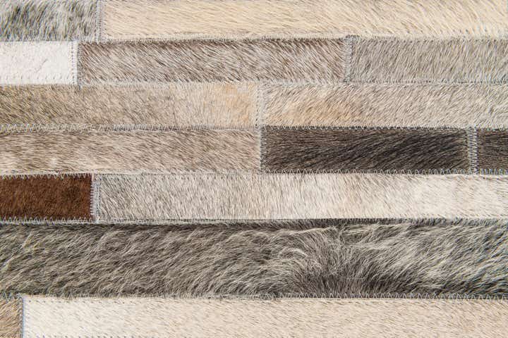 5' 1 x 7' 11 Cowhide Stocks Rug