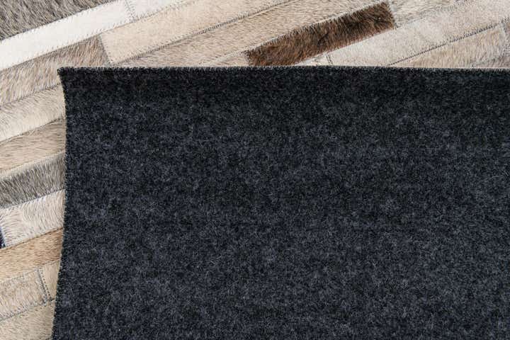 5' 1 x 7' 11 Cowhide Stocks Rug