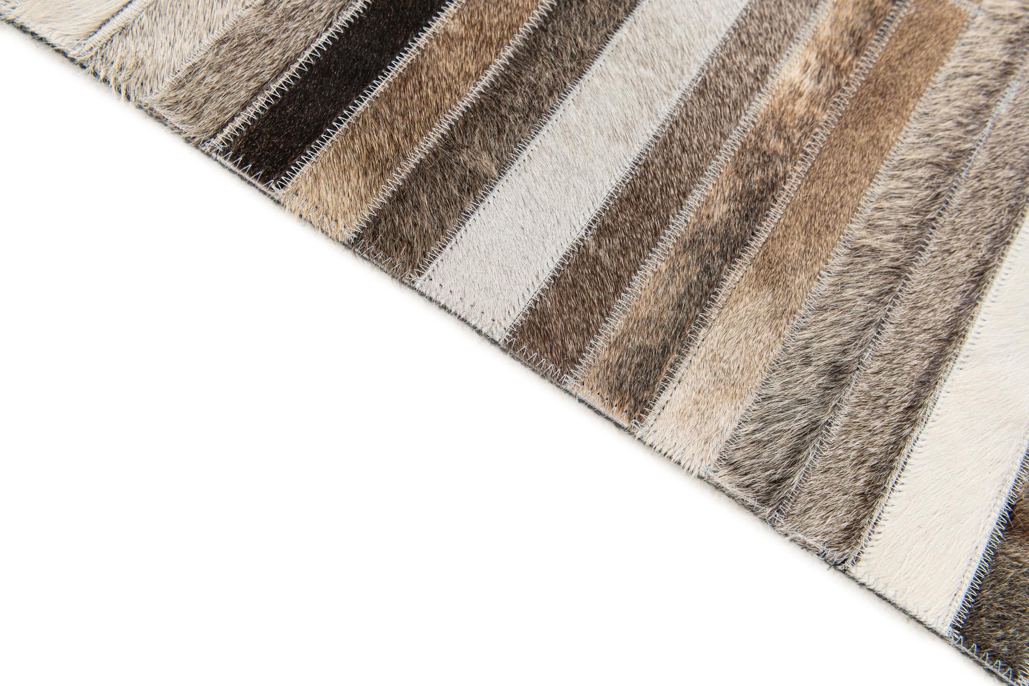 5' 1 x 8' Cowhide Stocks Rug