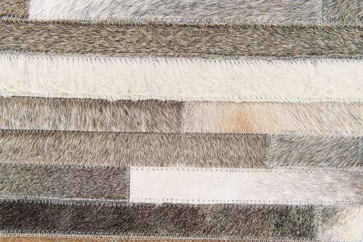 5' 1 x 8' Cowhide Stocks Rug