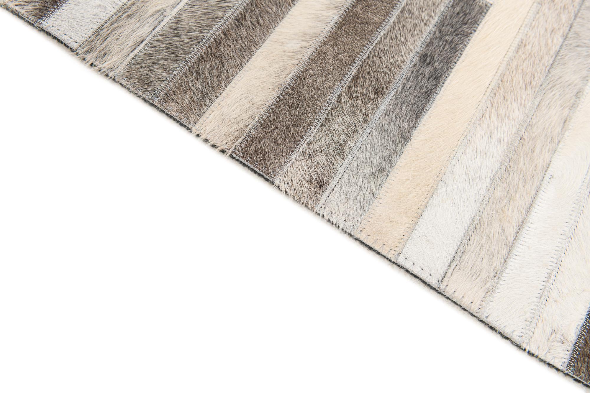 5' 1 x 7' 11 Cowhide Stocks Rug