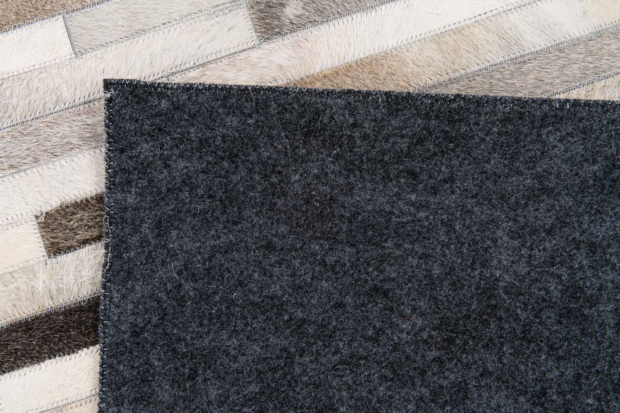 5' 1 x 7' 11 Cowhide Stocks Rug