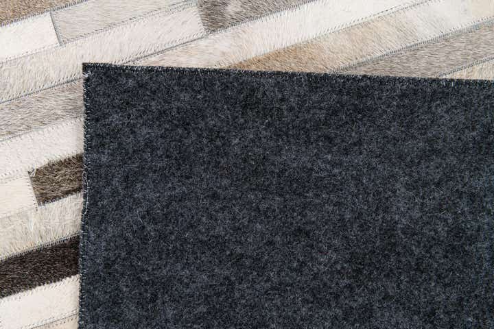 5' 1 x 7' 11 Cowhide Stocks Rug