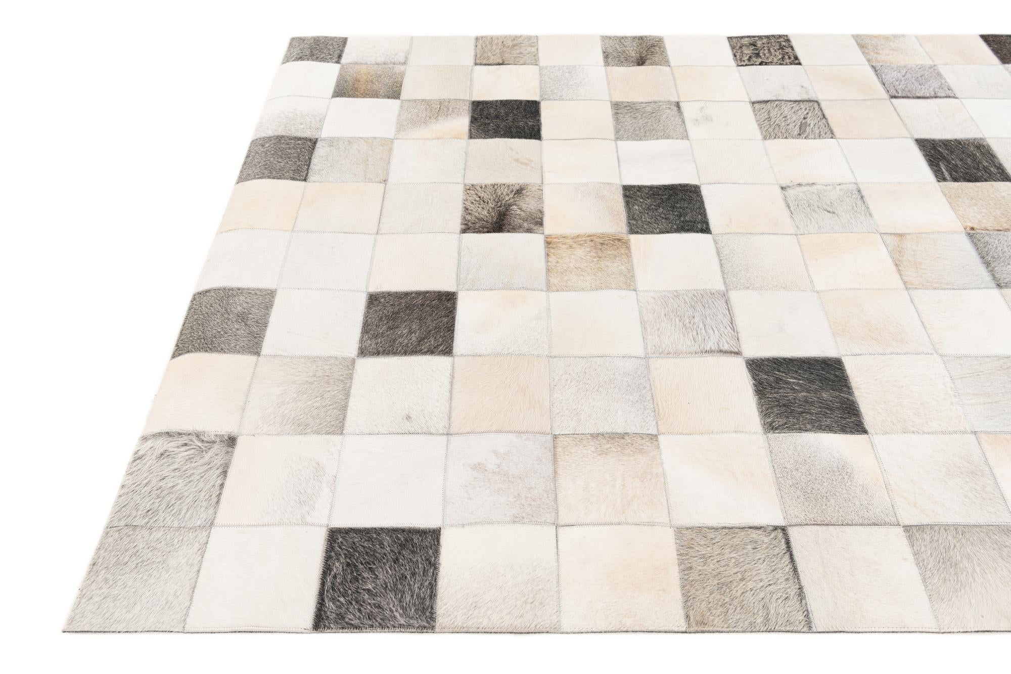 5' x 7' 11 Cowhide Stocks Rug