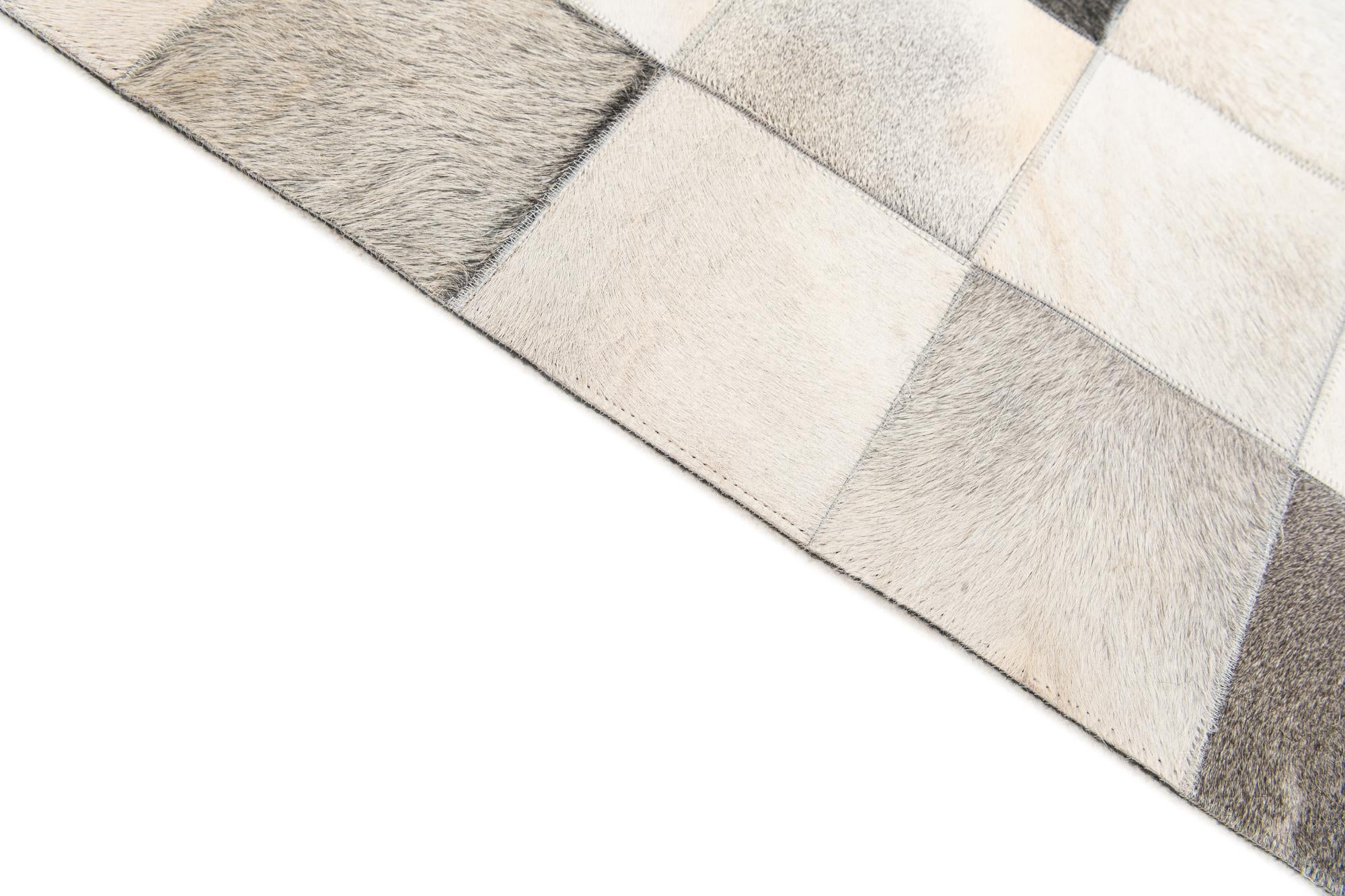5' x 7' 11 Cowhide Stocks Rug