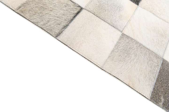 5' x 7' 11 Cowhide Stocks Rug