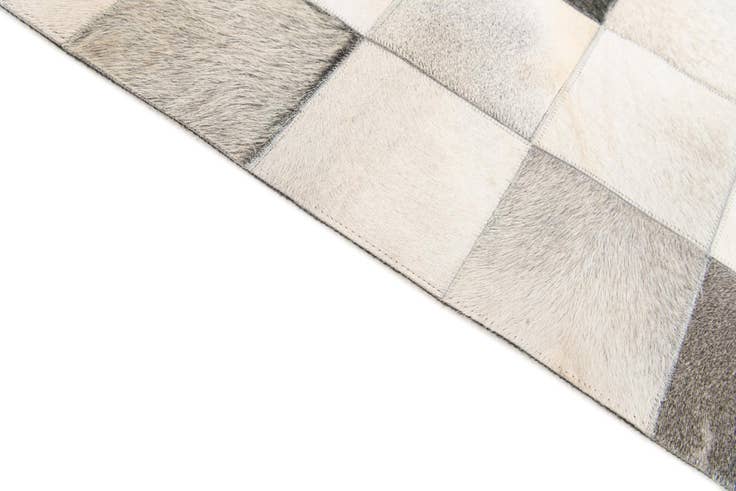 Detail image of 5' x 7' 11 Cowhide Stocks Rug
