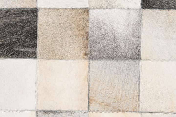 5' x 7' 11 Cowhide Stocks Rug