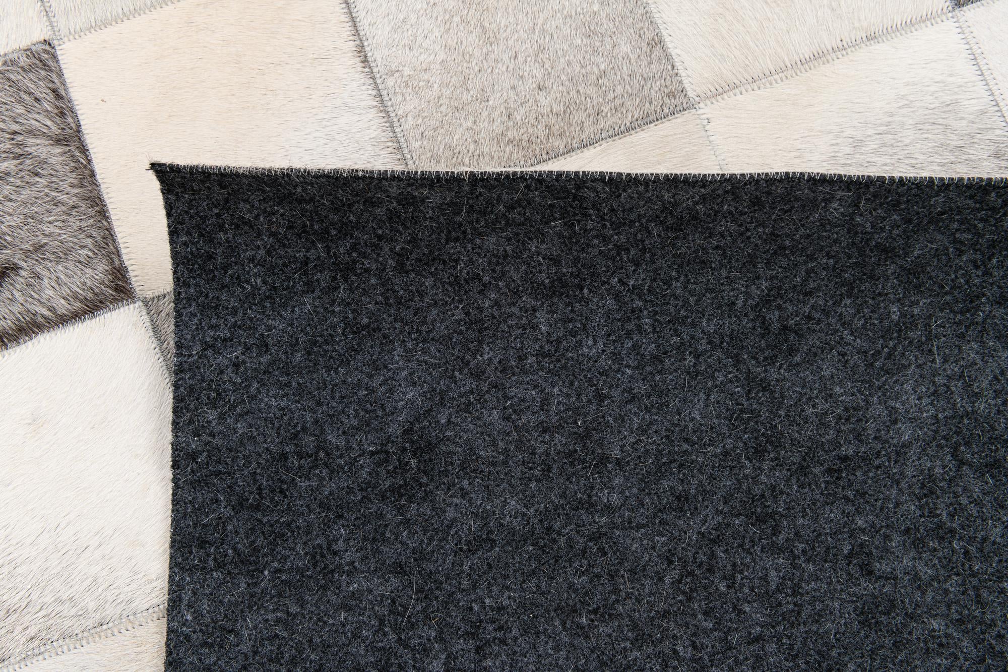 5' x 7' 11 Cowhide Stocks Rug