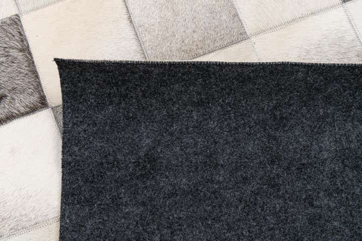 5' x 7' 11 Cowhide Stocks Rug