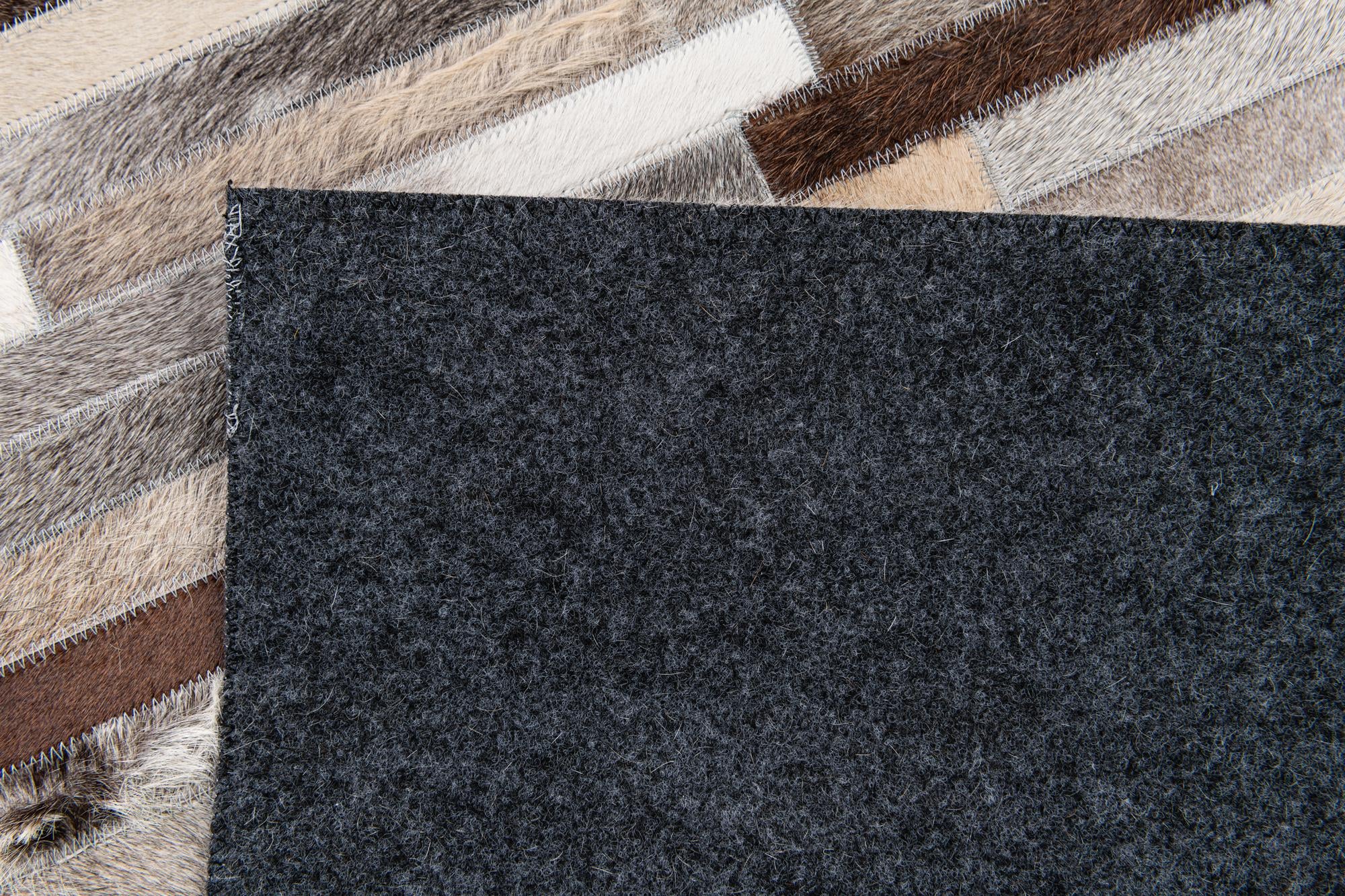 5' 1 x 7' 11 Cowhide Stocks Rug