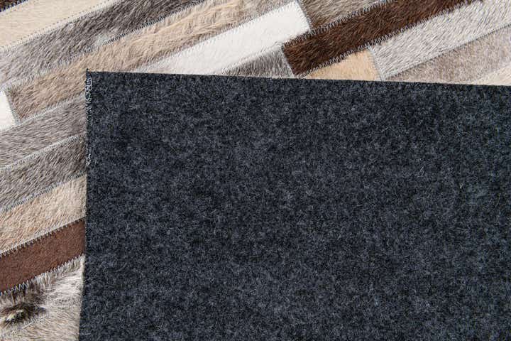 5' 1 x 7' 11 Cowhide Stocks Rug