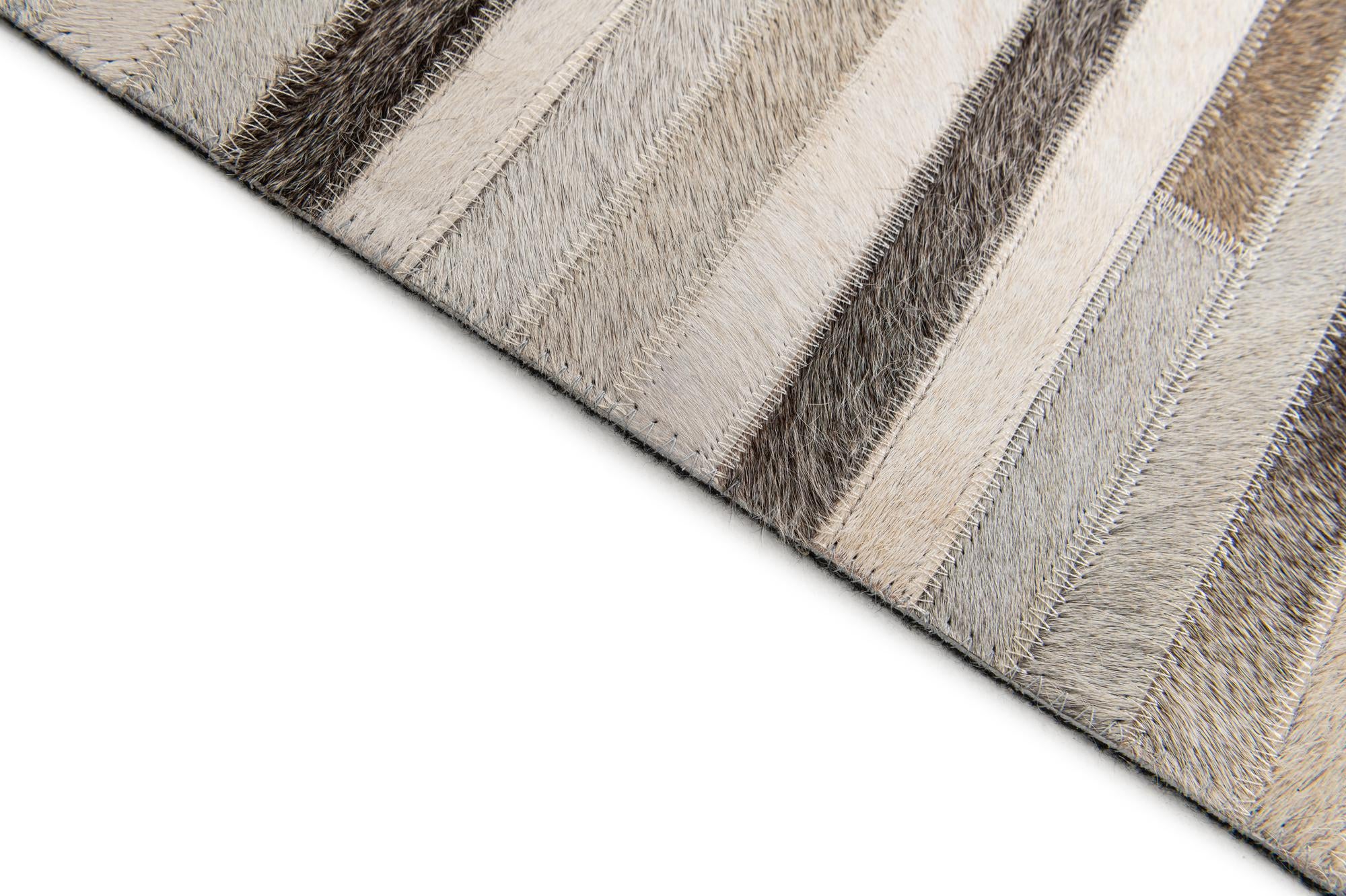 5' 1 x 8' Cowhide Stocks Rug