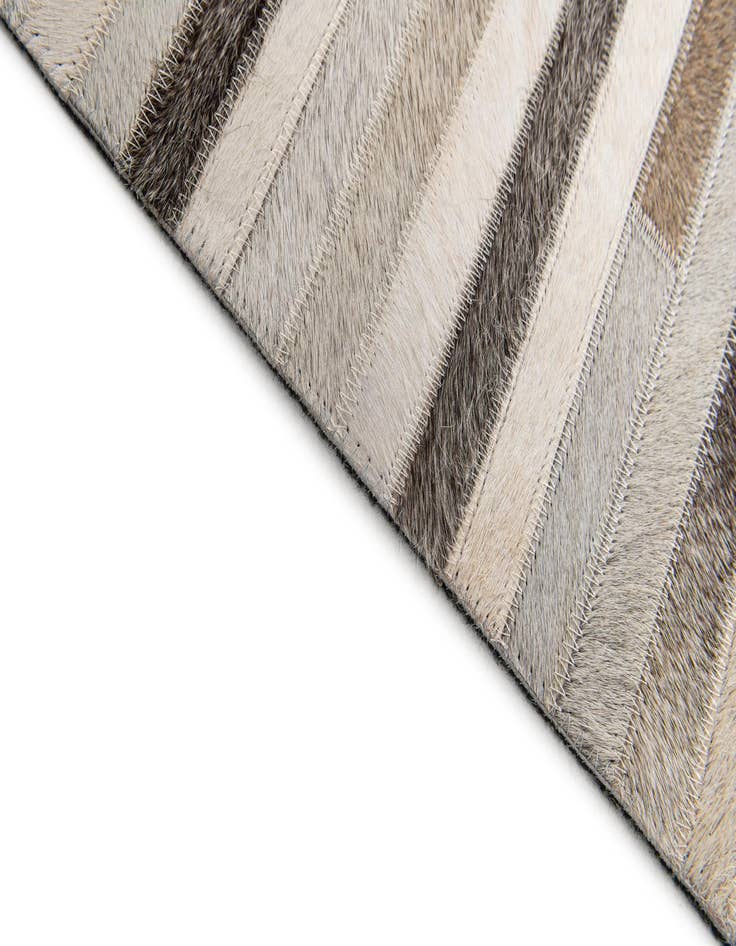 Detail image of 5' 1 x 8' Cowhide Stocks Rug