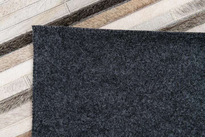 5' 1 x 8' Cowhide Stocks Rug