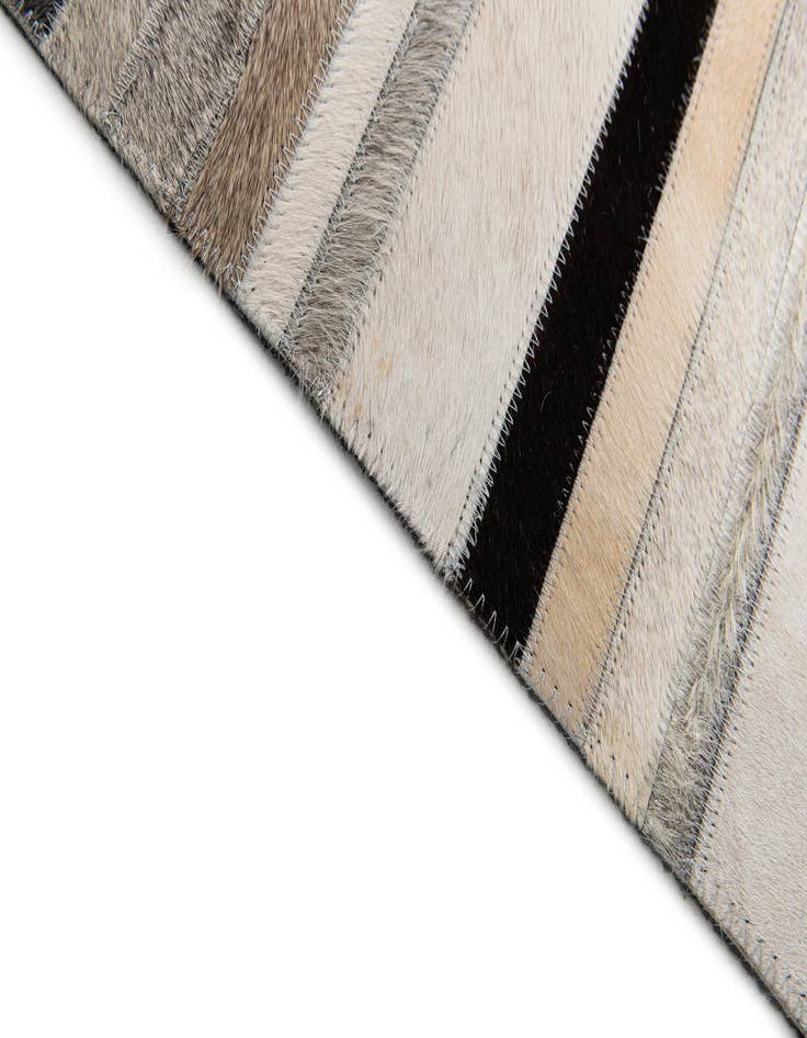Detail image of 5' 1 x 7' 11 Cowhide Stocks Rug