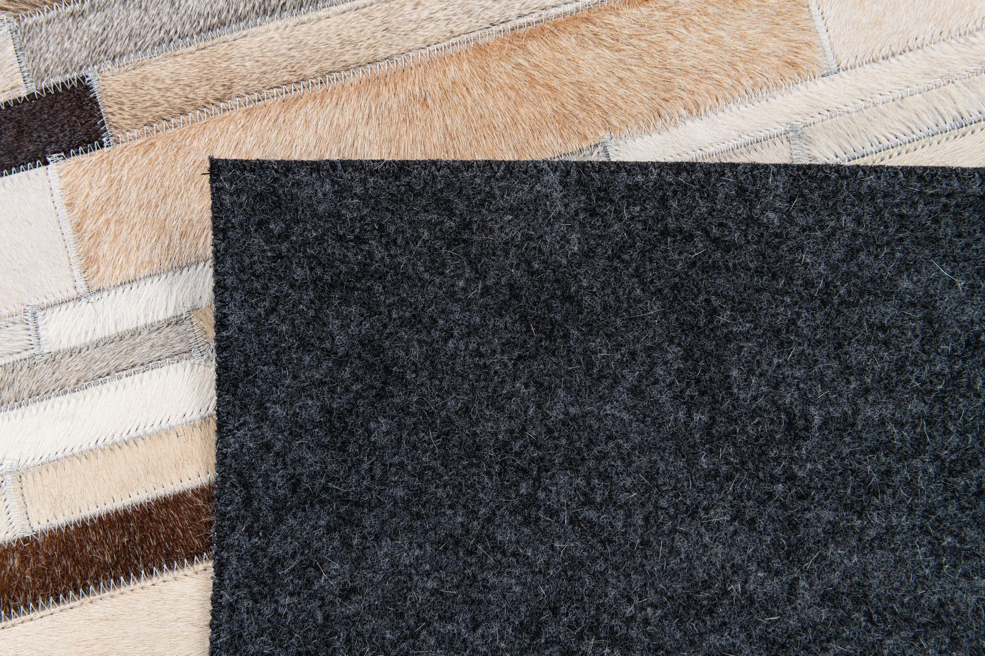5' 1 x 7' 11 Cowhide Stocks Rug