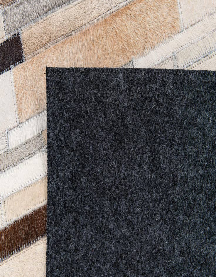 Detail image of 5' 1 x 7' 11 Cowhide Stocks Rug