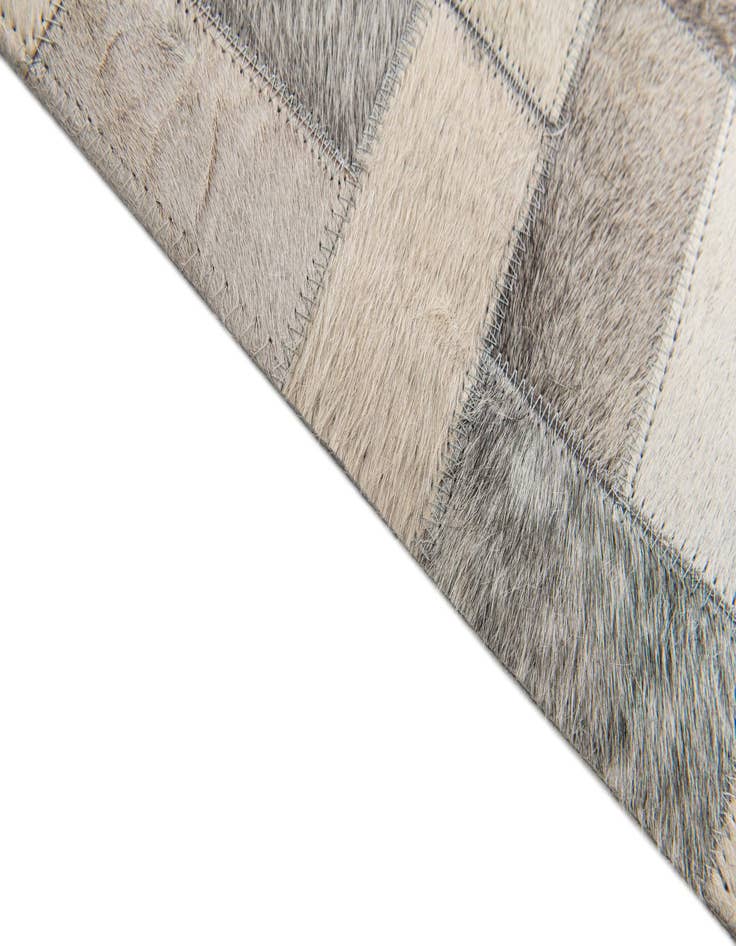 Detail image of 5' 1 x 8' Cowhide Stocks Rug
