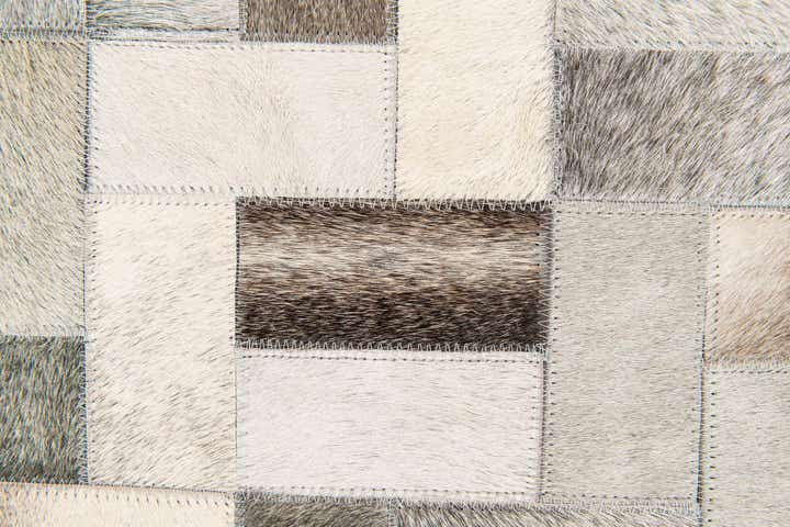 5' 1 x 8' Cowhide Stocks Rug