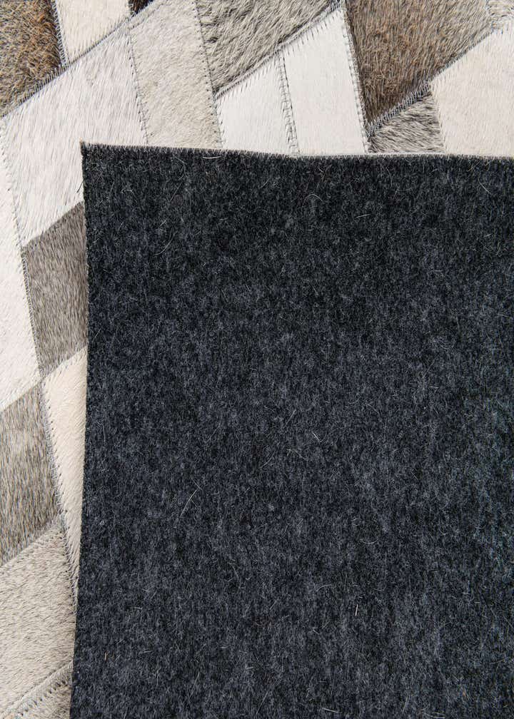 5' 1 x 8' Cowhide Stocks Rug