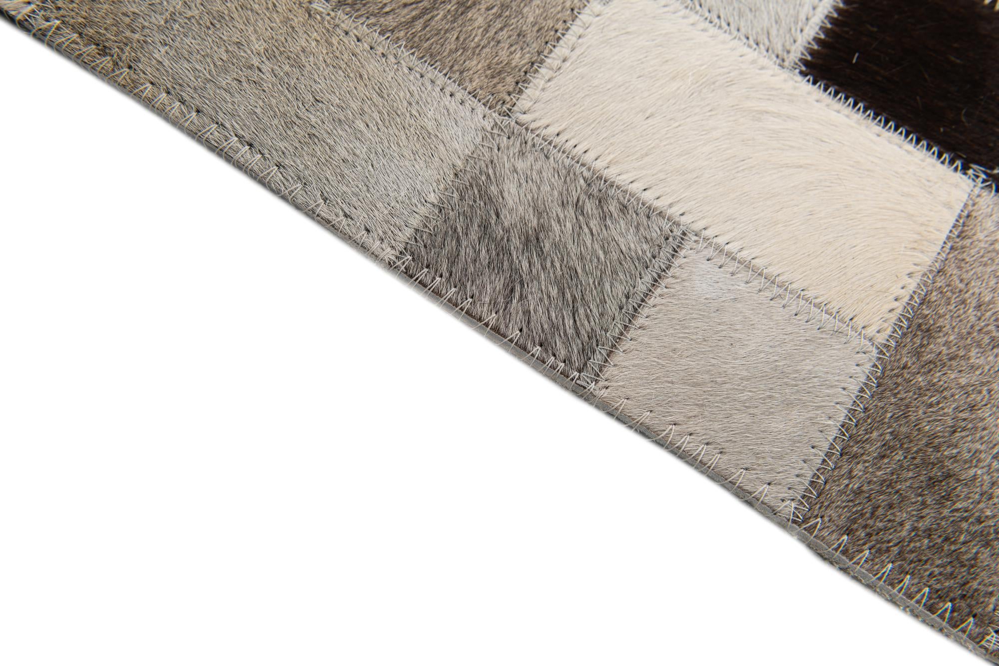 5' x 7' 10 Cowhide Stocks Rug