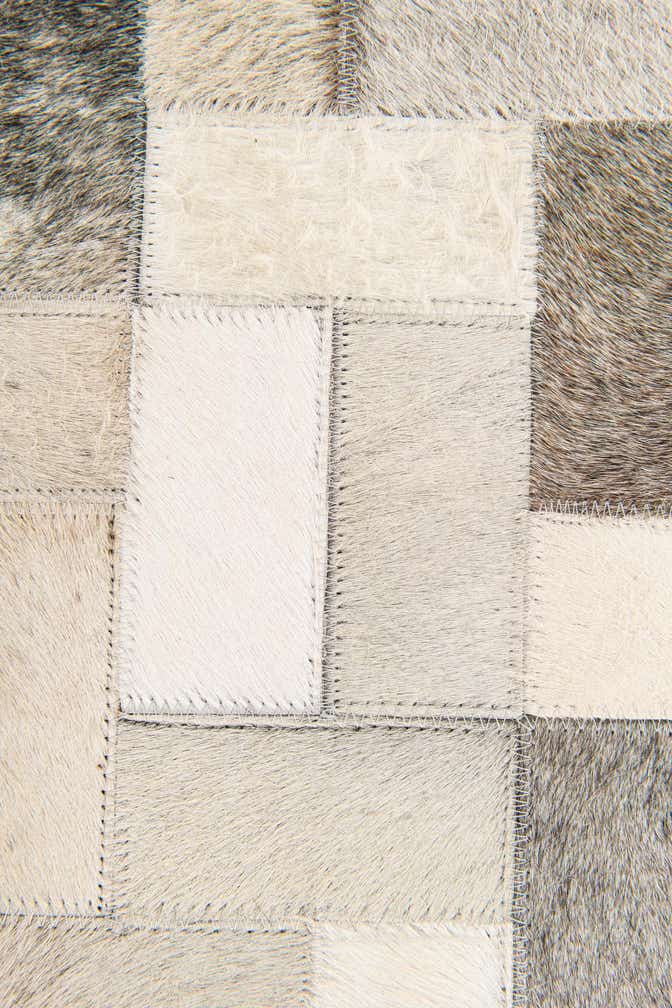 5' x 7' 10 Cowhide Stocks Rug
