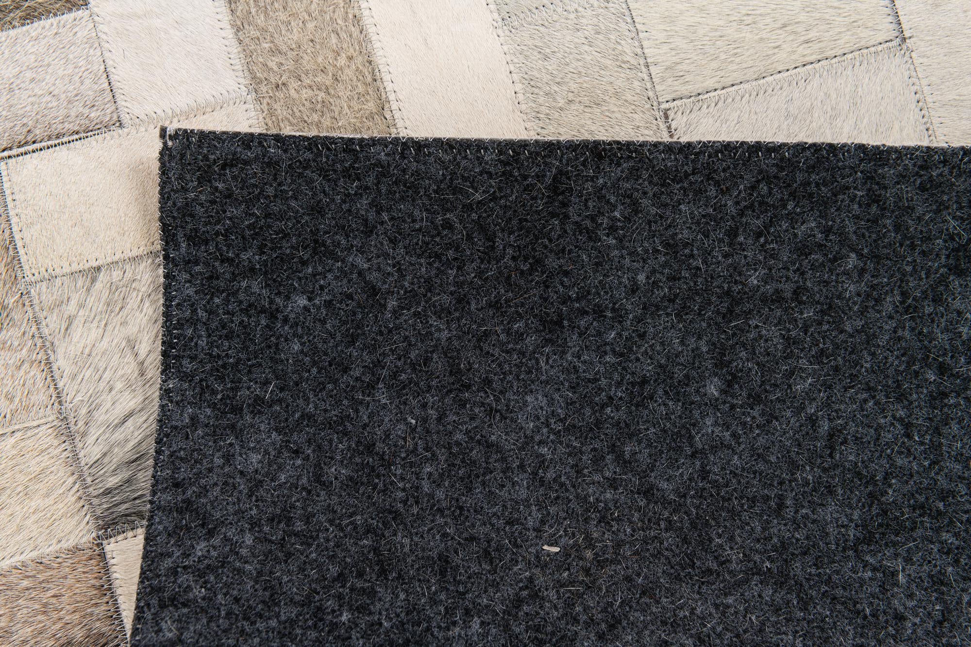 5' x 7' 10 Cowhide Stocks Rug