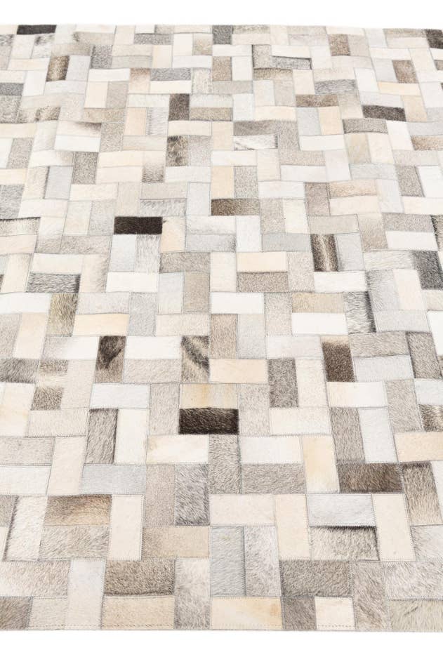 Detail image of 5' 1 x 8' Cowhide Stocks Rug