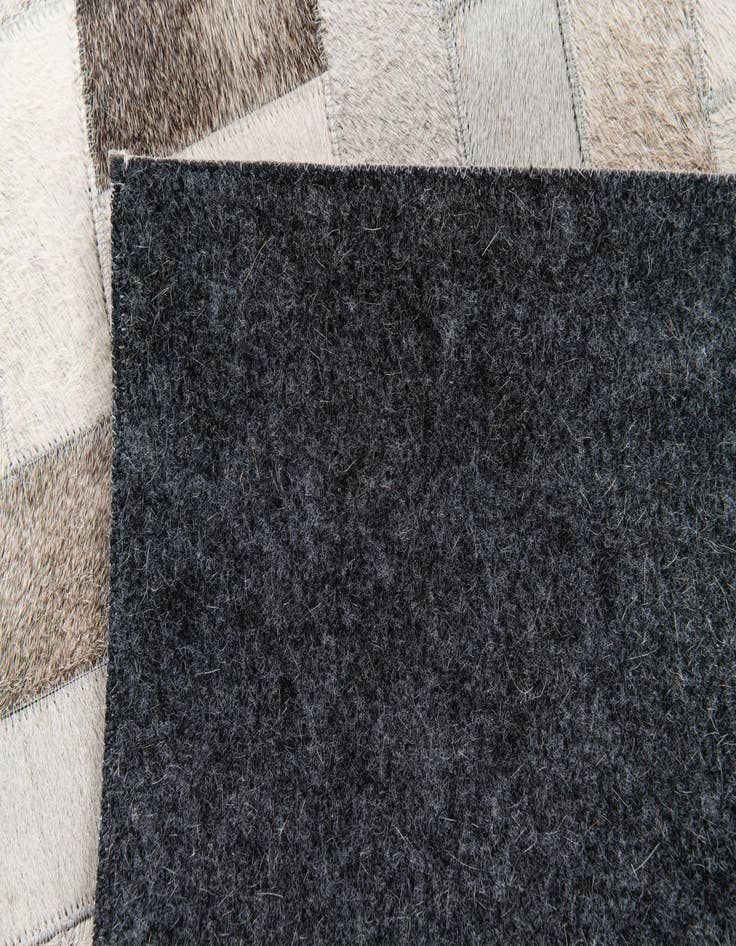 Detail image of 5' 1 x 8' Cowhide Stocks Rug