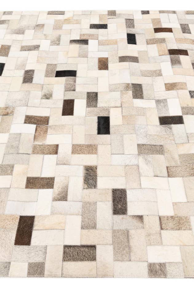Detail image of 5' x 7' 11 Cowhide Stocks Rug