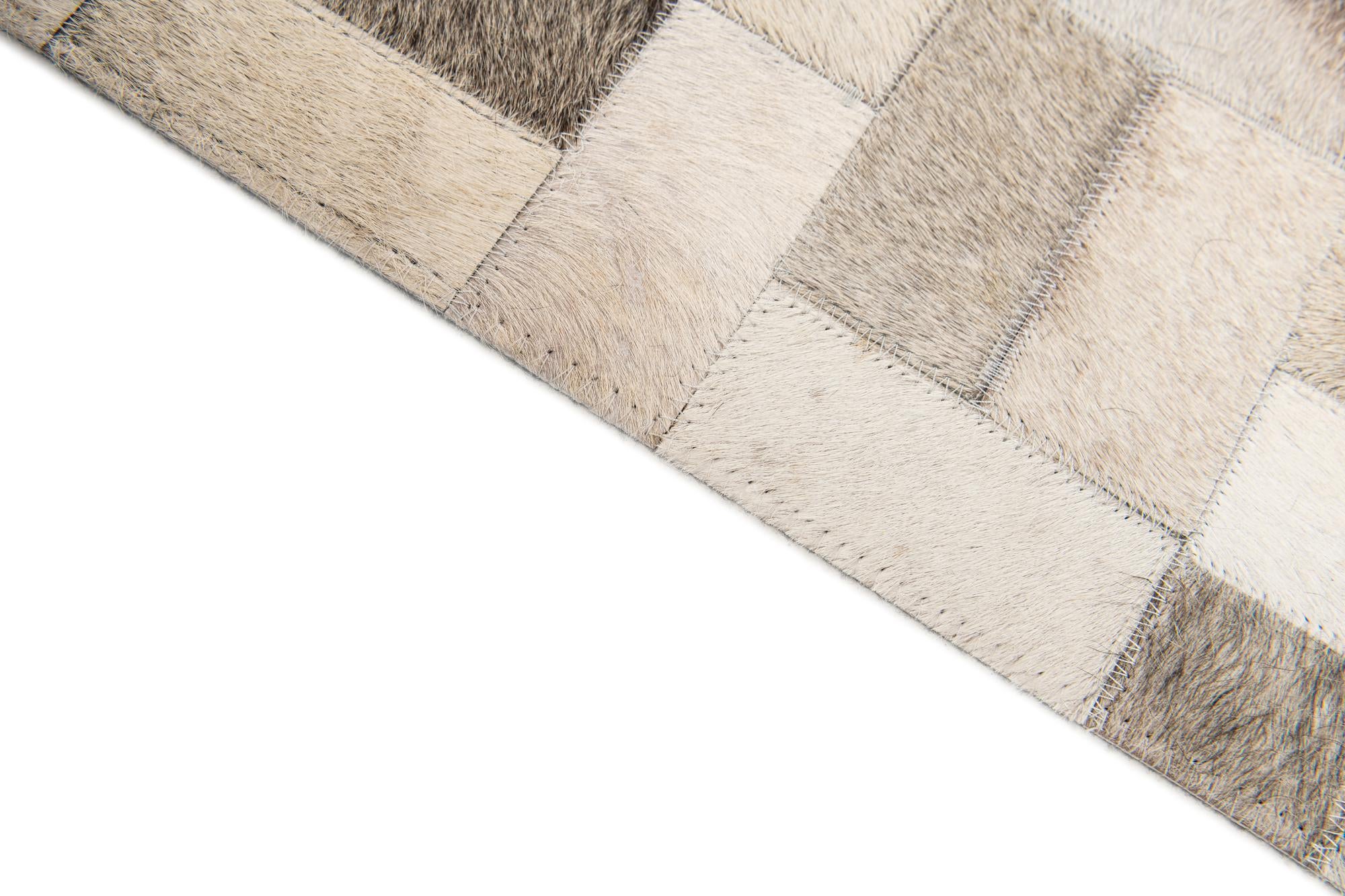 5' x 7' 11 Cowhide Stocks Rug
