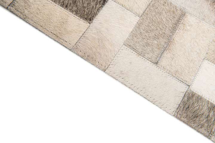 5' x 7' 11 Cowhide Stocks Rug