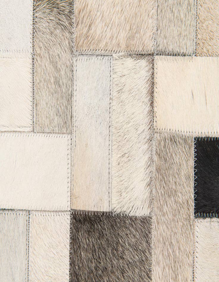Detail image of 5' x 7' 11 Cowhide Stocks Rug
