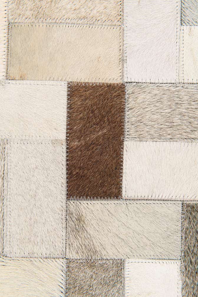 5' x 7' 11 Cowhide Stocks Rug