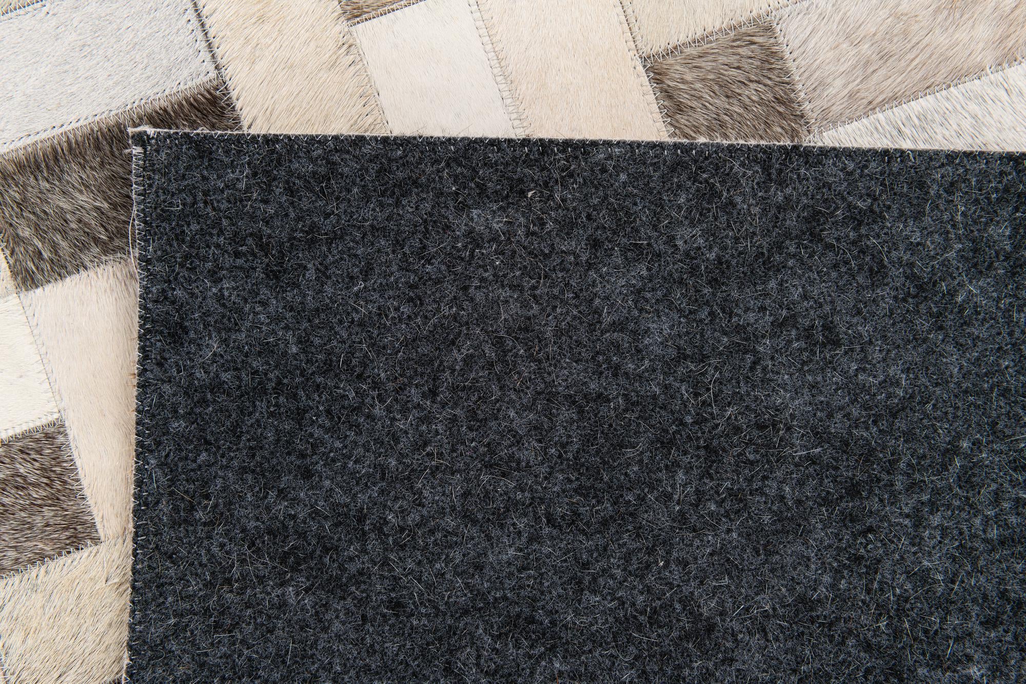 5' x 7' 11 Cowhide Stocks Rug