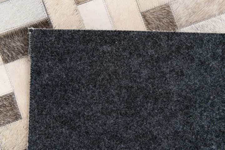 5' x 7' 11 Cowhide Stocks Rug